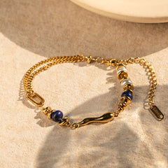 Ocean Bloom Bracelet – 18K Gold with Pearl and Lapis Lazuli Water Drop Design