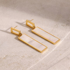 Elegant rectangular earrings with vertical shape and subtle sparkle