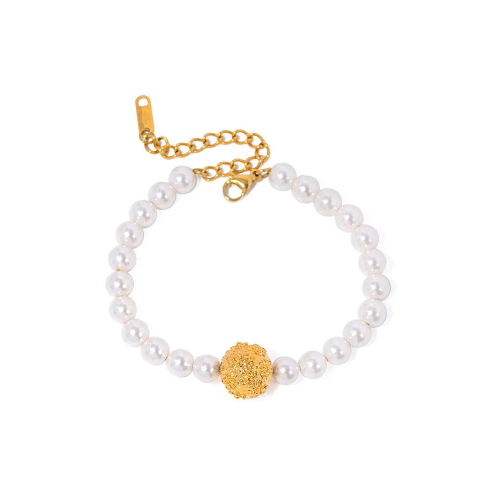Regal Bloom – 18K Gold Hammered Flower and Pearl Design Bracelet