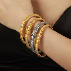 Intricate cross line texture in 18K gold on Vintage Crossroads Bracelet