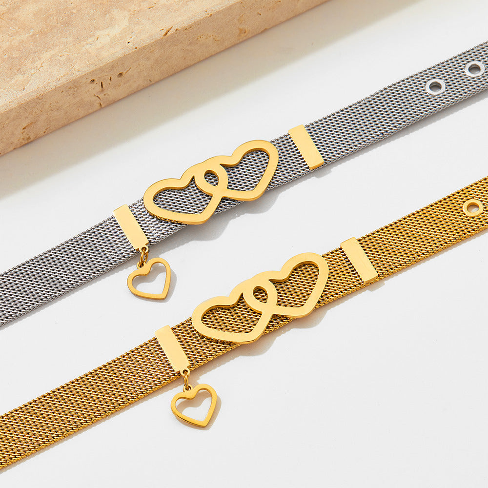Romantic heart motif and strap-inspired styling on Eternal Bond 18K Gold Bracelet