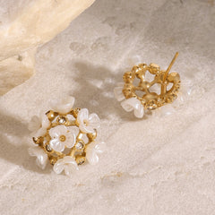 Elegant flower-shaped earrings with gemstone sparkle and 18K gold finish