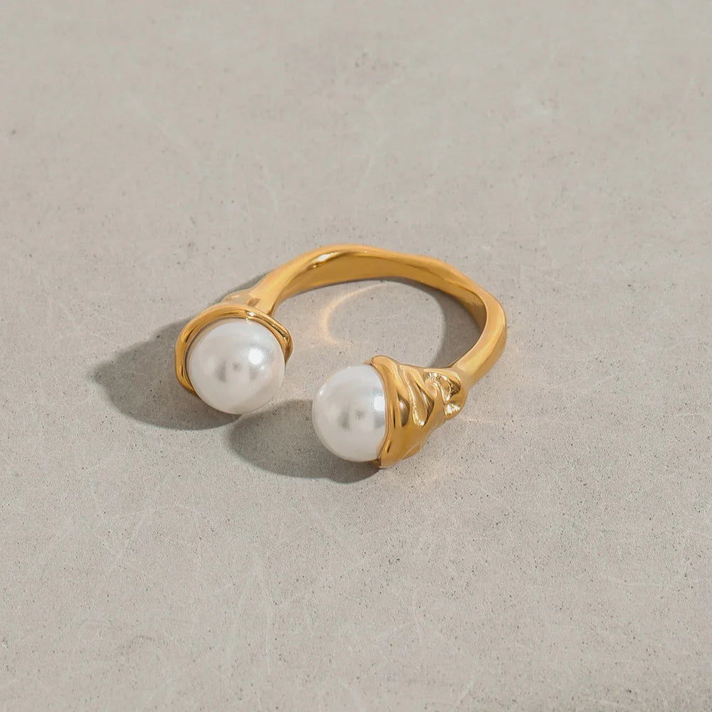 Minimalist gold ring with dual pearls at open ends