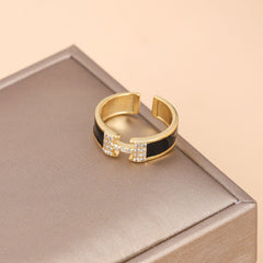 Model wearing minimalist H letter open ring with casual outfit