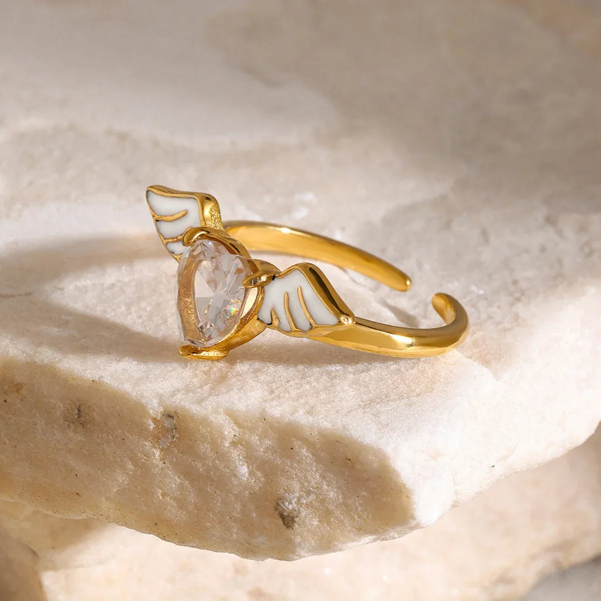 Celestial Heart 18K Gold Angel Wings Ring with Heart-Shaped Gemstone - Argesteel