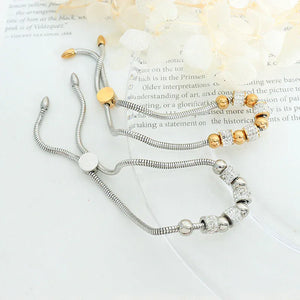 Regal Sphere – 18K Gold Round Beads and Cylindrical Diamond Bracelet