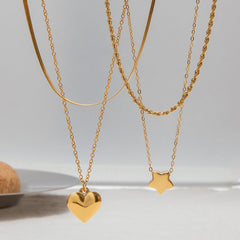 18K gold double chain necklace with heart pendant layered design