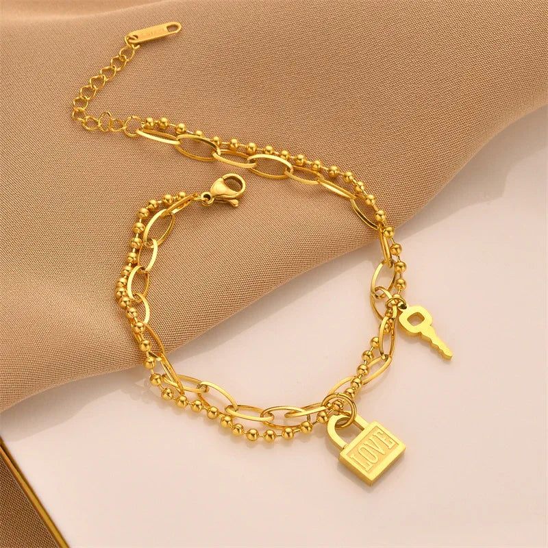 Gift-ready gold bracelet with symbolic heart charm
