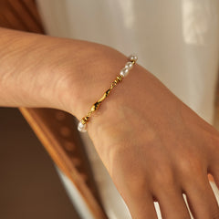 Delicate water drop pendants and pearls on Vintage Drizzle 18K gold bracelet
