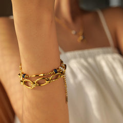 Elegant Ocean Bloom Bracelet featuring 18K gold, water drop shape, pearls, and lapis lazuli