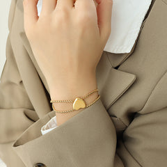 Elegant 18K gold bracelet with romantic and modern motifs