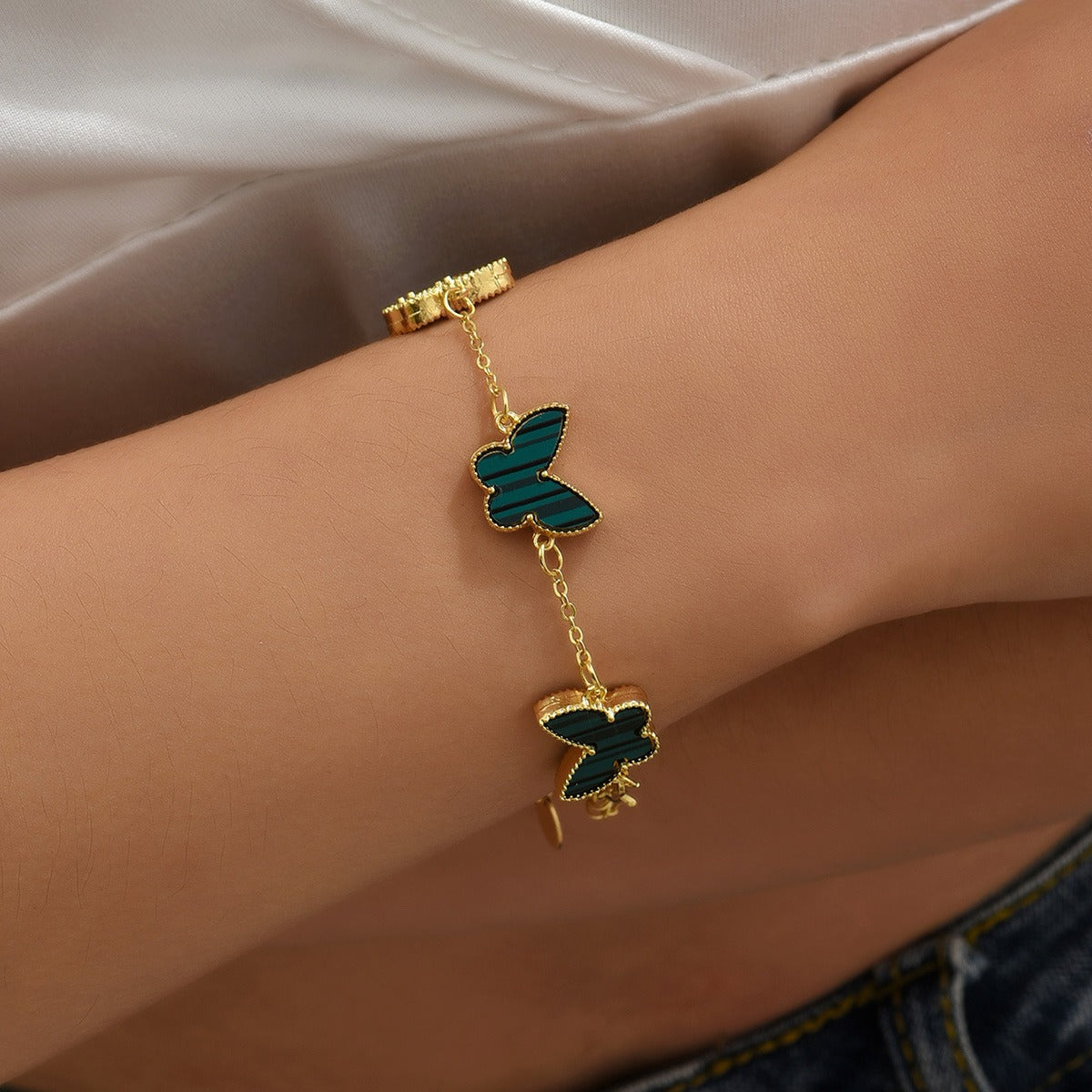 Wings of Fortune Bracelet – 18K Gold Butterfly and Clover Pendant for Women