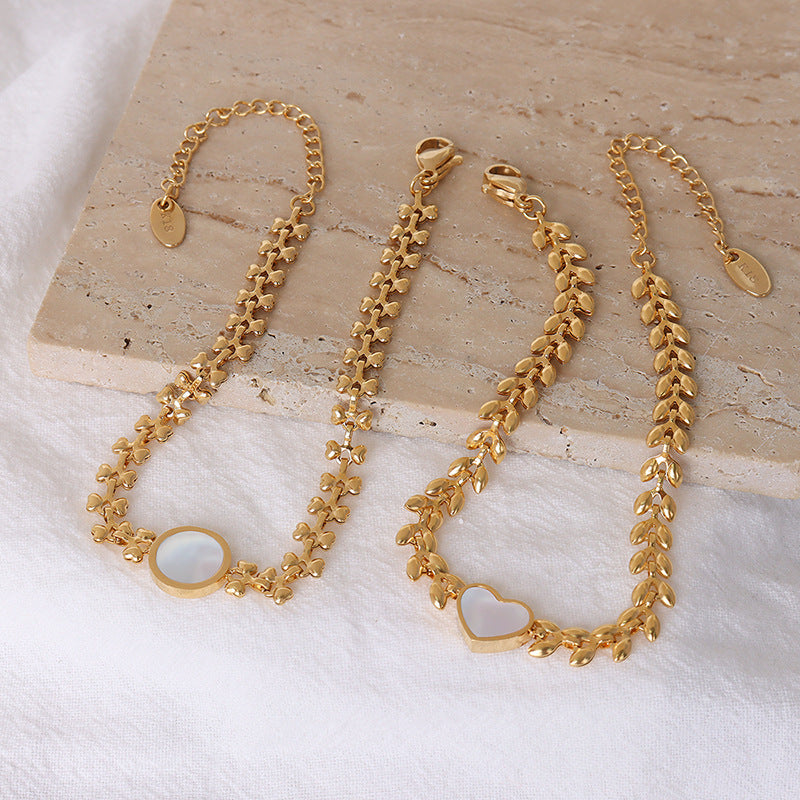 Golden Harvest Bracelet – Titanium Steel with White Seashell and Wheat Motif