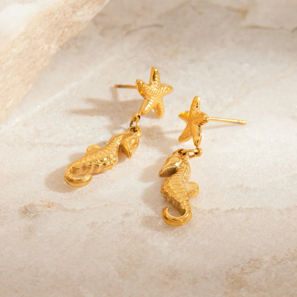 Trendy marine gold earrings for women with seahorse design